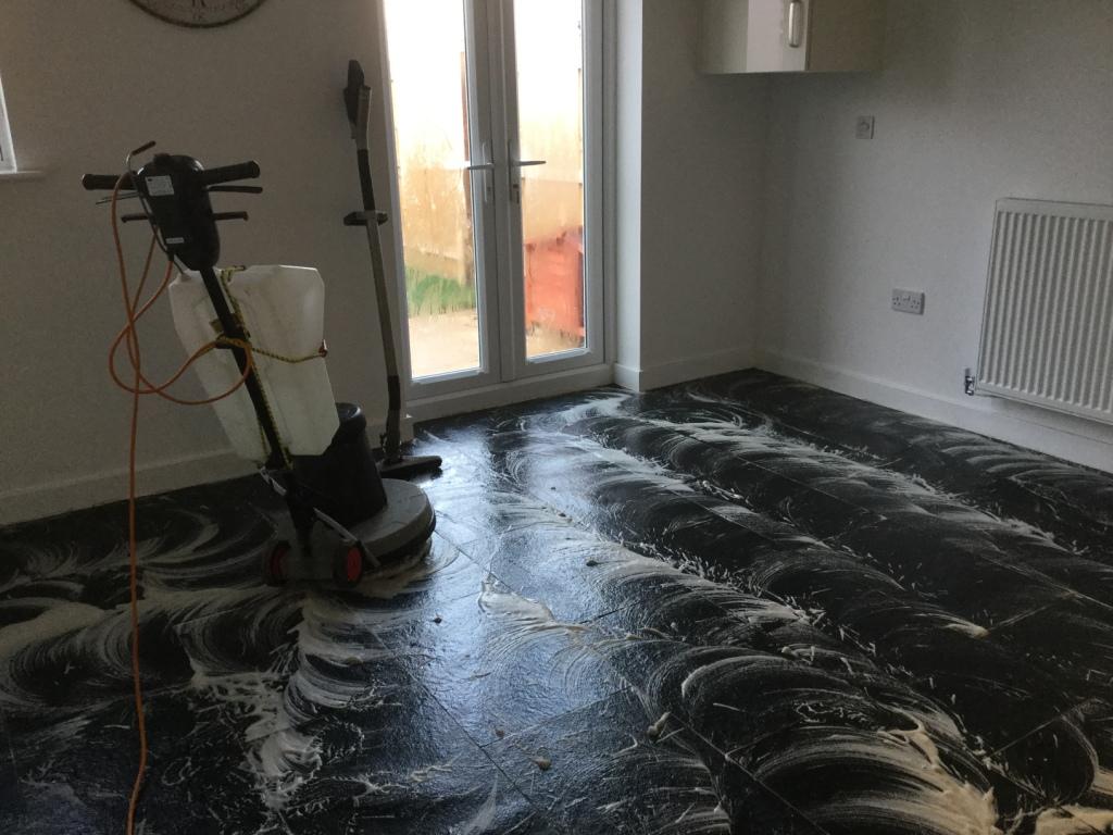 Black limestone floor Wixams during cleaning